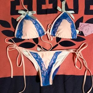 NWT Reteron 2 piece. It’s very delicate and well??